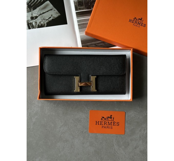 Гаманець Hermès Constance Long To Go: чорна шкіра та золого кольору H