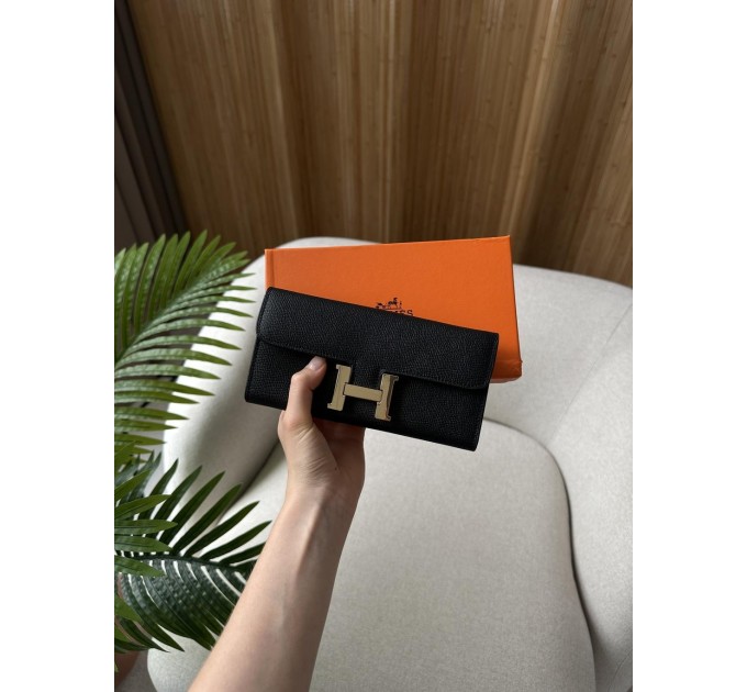 Гаманець Hermès Constance Long To Go: чорна шкіра та золого кольору H