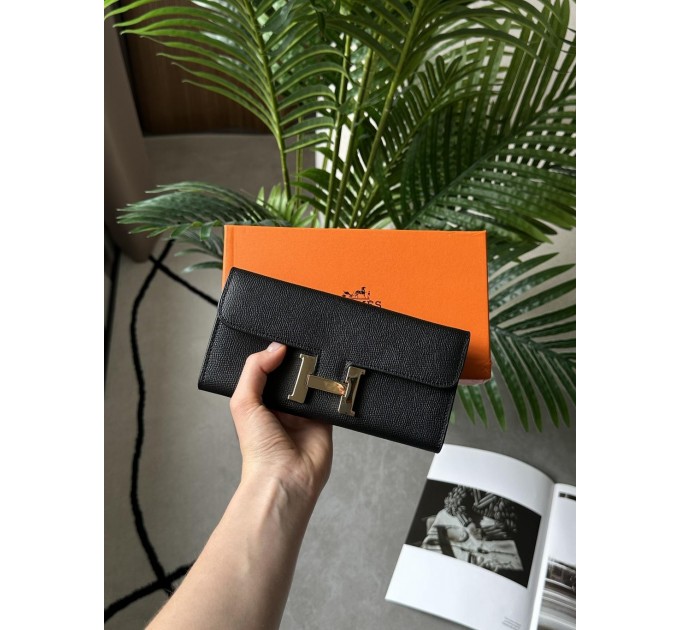 Гаманець Hermès Constance Long To Go: чорна шкіра та золого кольору H