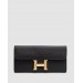 Гаманець Hermès Constance Long To Go: чорна шкіра та золого кольору H