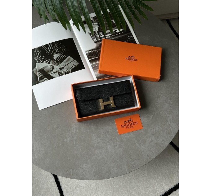 Гаманець Hermès Constance Long To Go: чорна шкіра та золого кольору H