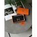 Гаманець Hermès Constance Long To Go: чорна шкіра та золого кольору H