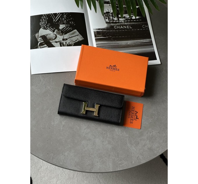 Гаманець Hermès Constance Long To Go: чорна шкіра та золого кольору H