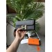 Гаманець Hermès Constance Long To Go: чорна шкіра та золого кольору H