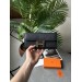Гаманець Hermès Constance Long To Go: чорна шкіра та золого кольору H