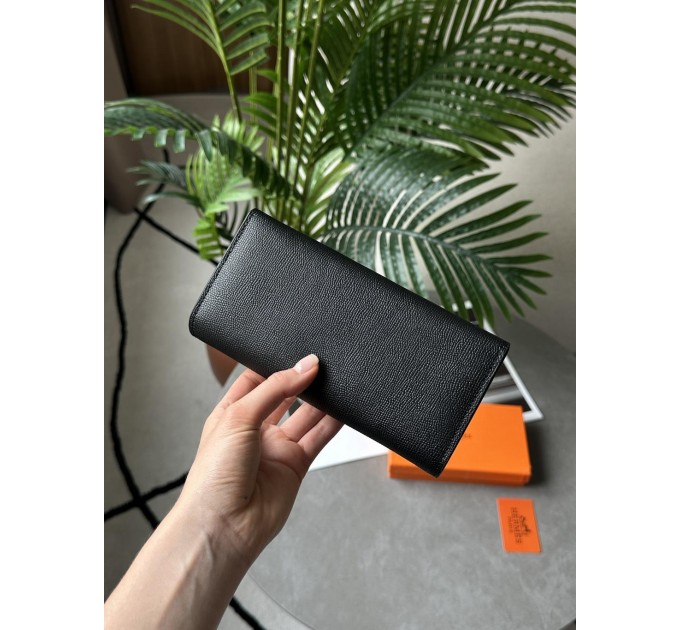 Гаманець Hermès Constance Long To Go: чорна шкіра та золого кольору H