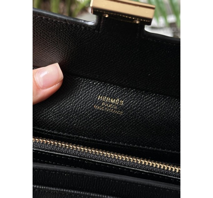 Гаманець Hermès Constance Long To Go: чорна шкіра та золого кольору H