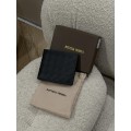 Гаманець Bottega Veneta Intrecciato: плетена шкіра в компактному форматі