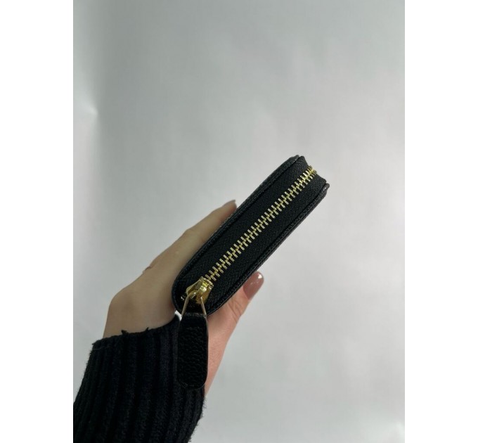 Клатч Chanel Boy: зерниста шкіра та золотий колір