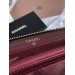 Клатч Chanel Boy: зерниста шкіра та золотий колір