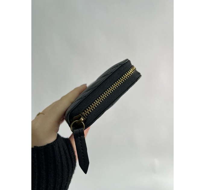 Клатч Gucci GG Marmont: стьобана шкіра Matelassé та золотий логотип