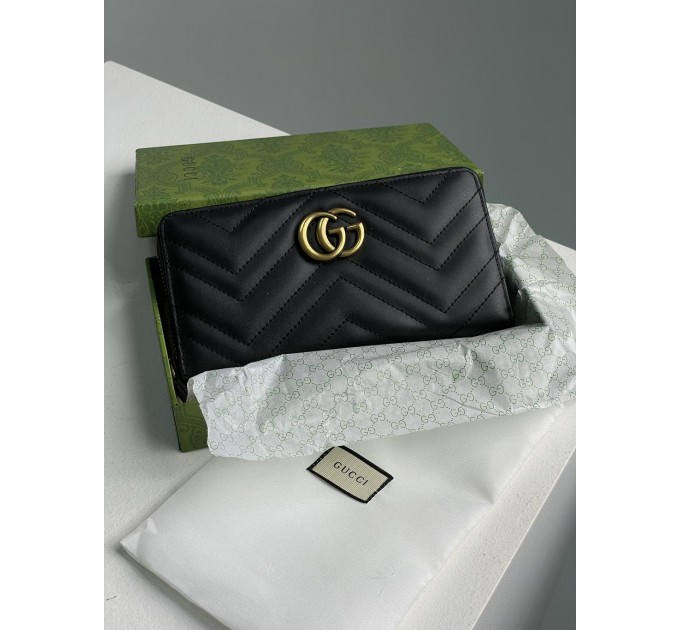 Клатч Gucci GG Marmont: стьобана шкіра Matelassé та золотий логотип