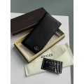 Клатч Gucci Marmont G: гладка шкіра та 12 відділень для карток