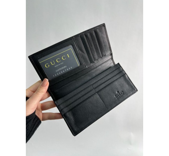 Клатч Gucci Marmont G: гладка шкіра та 12 відділень для карток