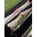 Клатч Gucci Guccissima: тиснена шкіра з фірмовою канвою