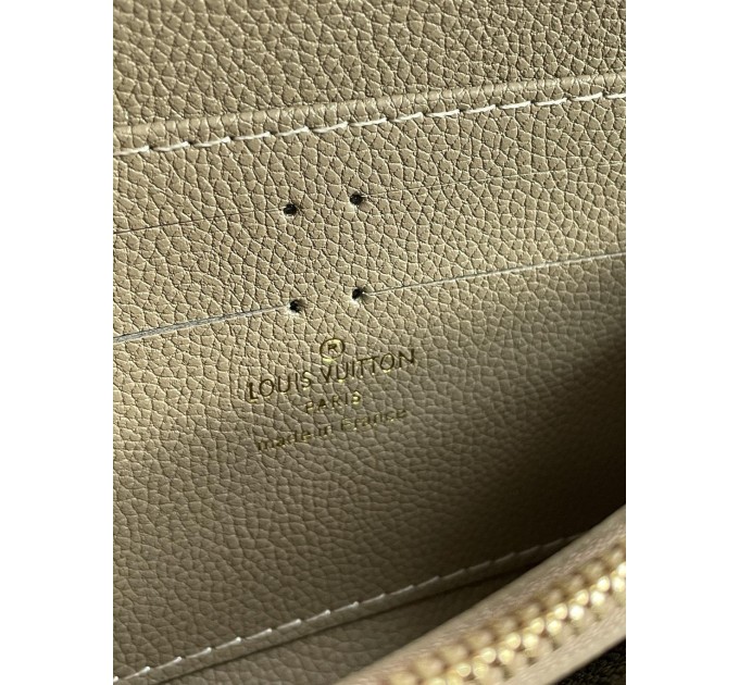 Клатч Louis Vuitton Clemence: двоколірний бежевий із фірмовим тисненням