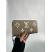 Клатч Louis Vuitton Clemence: двоколірний бежевий із фірмовим тисненням