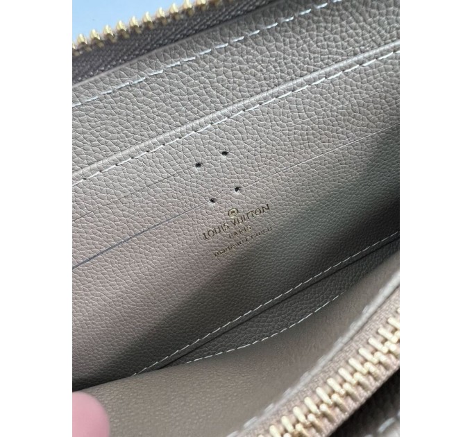Клатч Louis Vuitton Clemence: двоколірний бежевий із фірмовим тисненням