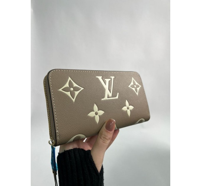 Клатч Louis Vuitton Clemence: двоколірний бежевий із фірмовим тисненням