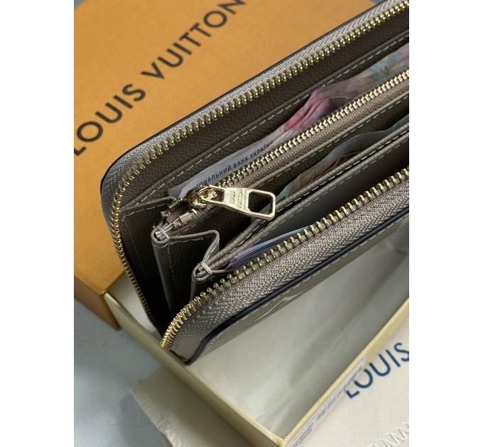Клатч Louis Vuitton Clemence: двоколірний бежевий із фірмовим тисненням
