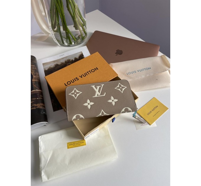 Клатч Louis Vuitton Clemence: двоколірний бежевий із фірмовим тисненням