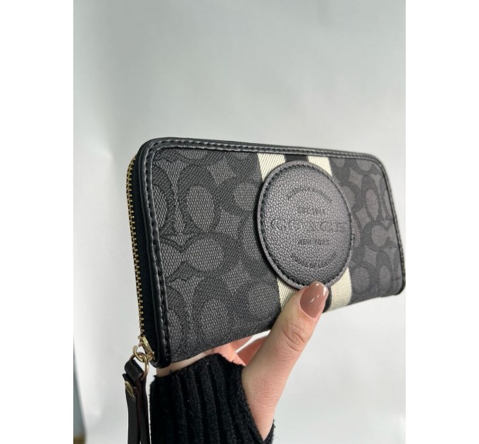 Клатч Coach Dempsey: фірмовий Jacquard та екошкіра