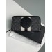 Клатч Coach Dempsey: фірмовий Jacquard та екошкіра