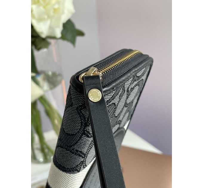Клатч Coach Dempsey: фірмовий Jacquard та екошкіра