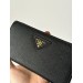 Клатч Prada Round Zippy: текстурна шкіра Nero Black