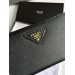 Клатч Prada Round Zippy: текстурна шкіра Nero Black