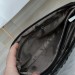 Містка чорна крос-боді з продуманою організацією